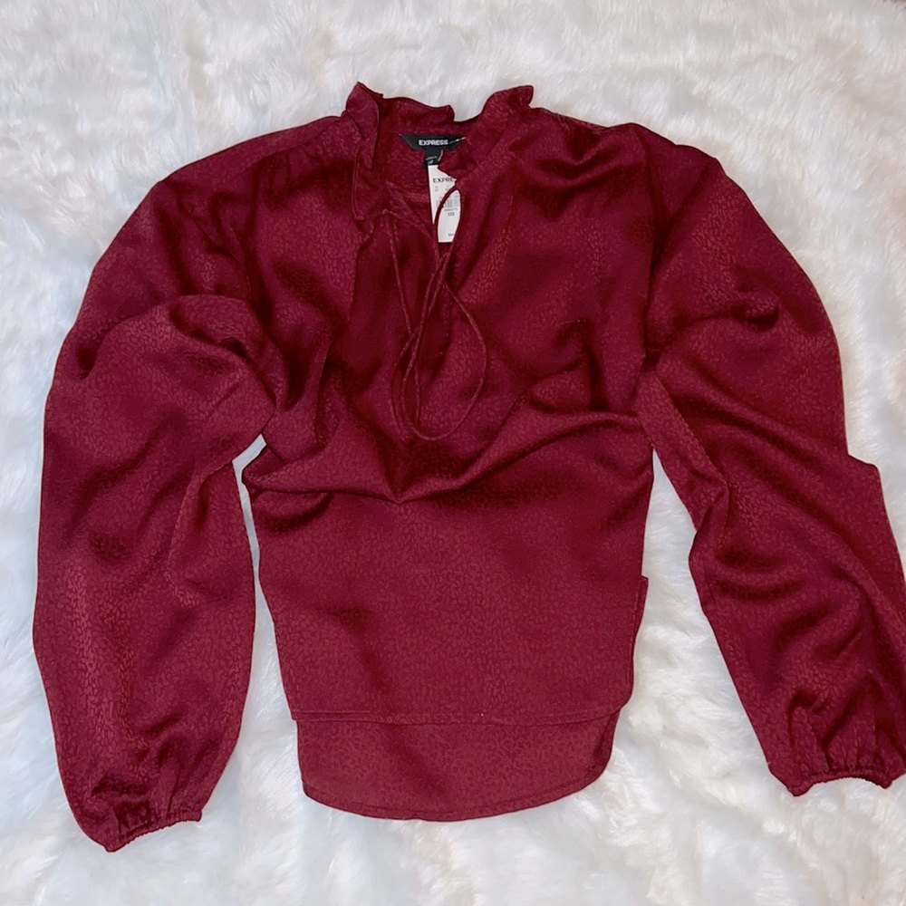 Express top silky with ruffles